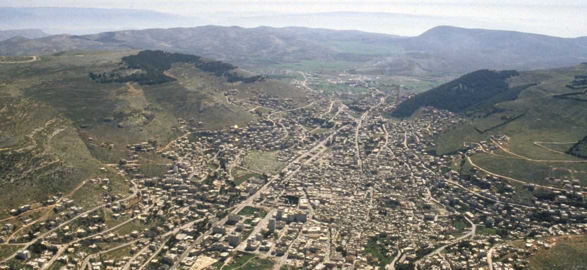 Aerial view of the city of Shechem (today's Nablus) with Mt Gerizim of the right and Mt Ebal on the left.